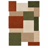 A modern geometric area rug featuring a patchwork design of rectangular blocks in rust red, olive green, beige, and cream, shown flat against a solid white background.