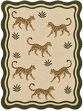 A rectangular area rug with a scalloped border, featuring a repeating pattern of walking cheetahs and small palm-like plants on a warm beige background.