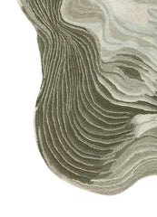 Abstract woolen hand-tufted rug with curved lines and earth-tone beige and olive green colors