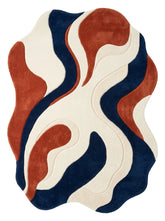 Abstract rug with wavy pattern in red, blue, and beige on a white background