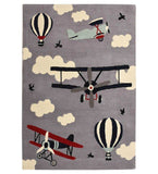 Hand-tufted wool rug with vintage biplanes, hot air balloons, clouds, and birds on gray background
