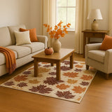 Cozy living room with beige sofa, armchair, autumn maple leaf rug, wooden coffee table, and fall decor