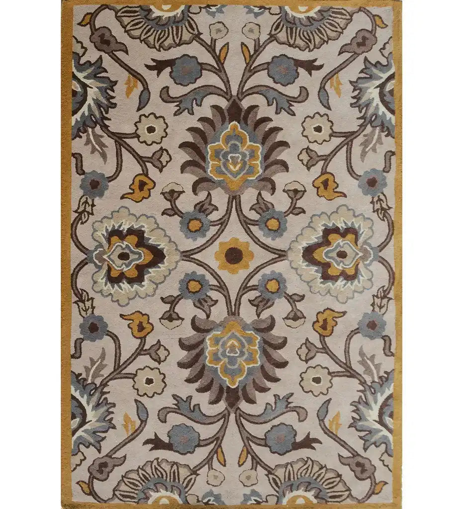 Beige hand-tufted traditional wool rug with floral motifs in blue, gold, and brown, framed by a gold border