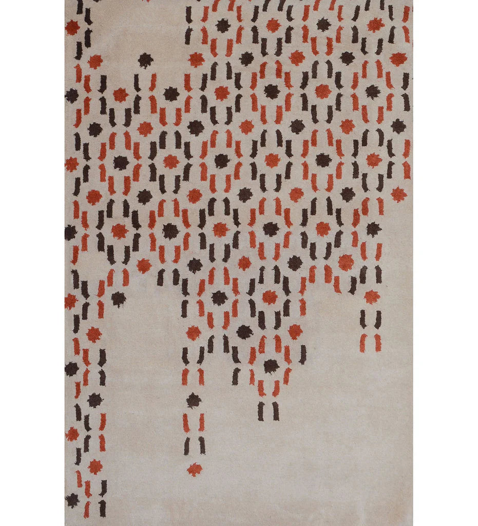 Beige and orange hand-tufted wool rug with cascading dot design