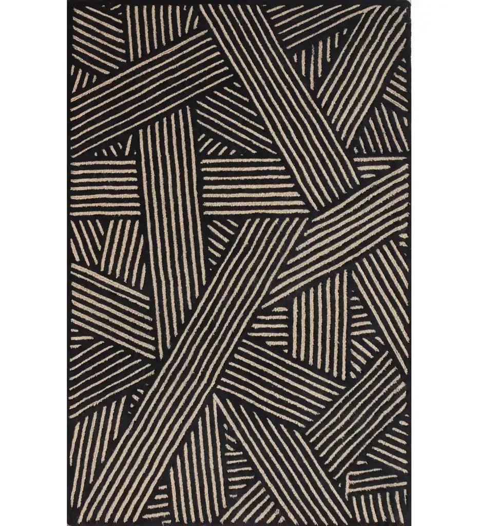 Beige and black hand-tufted wool rug with modern abstract line pattern.