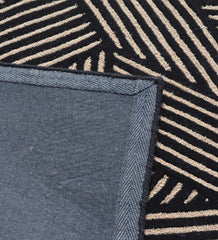 Designer hand-tufted area rug with abstract beige line detailing.