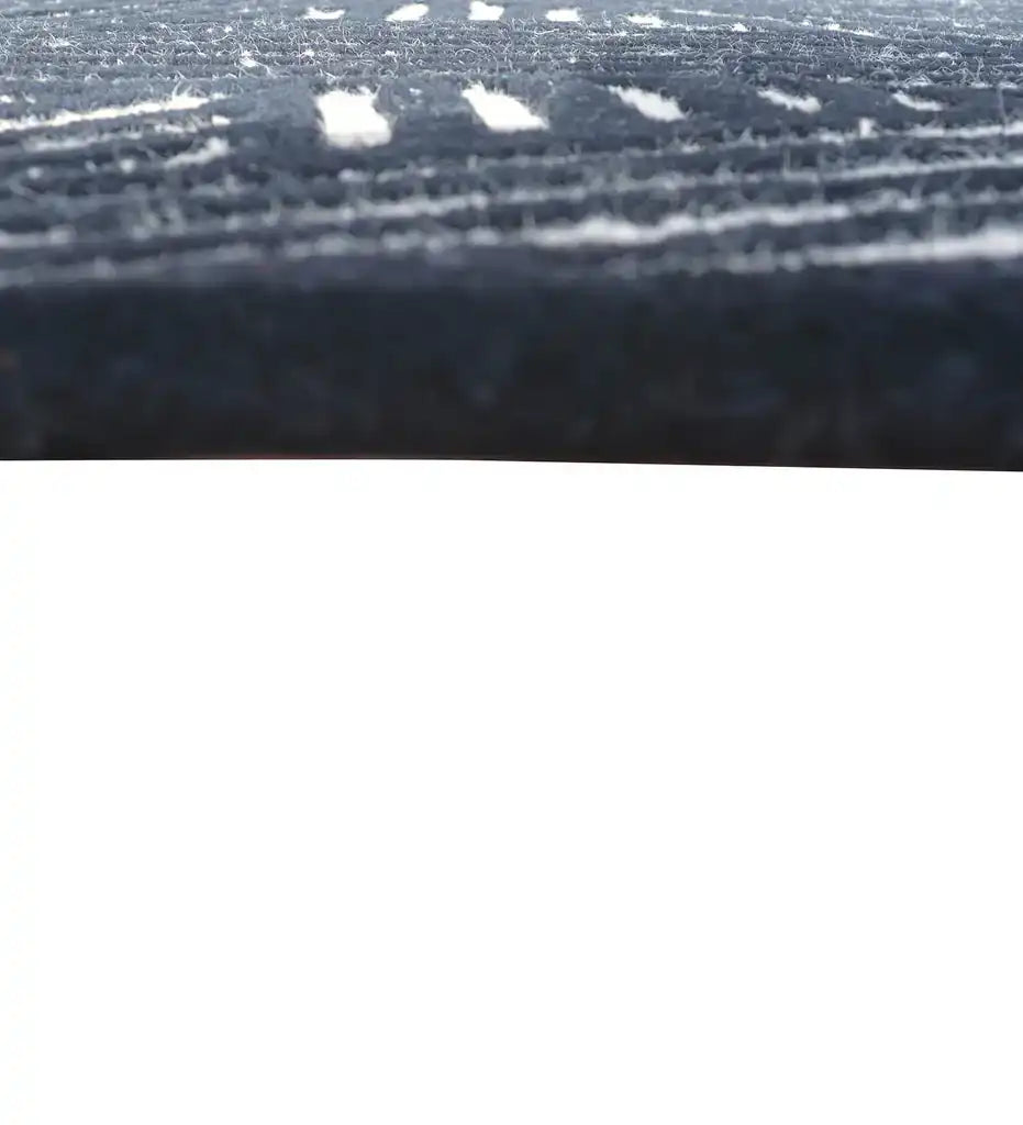 Contemporary wool rug in beige and black for modern living rooms.