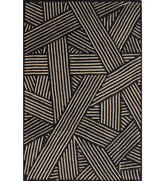 Beige and black hand-tufted wool rug with modern abstract line pattern.