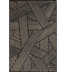 Beige and black hand-tufted wool rug with modern abstract line pattern.