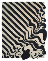 Luxury beige and black hand-tufted wool area rug with modern flow stripe design.