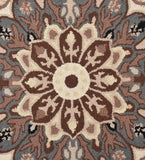 Close-up of beige and brown traditional floral rug with intricate hooked wool design
