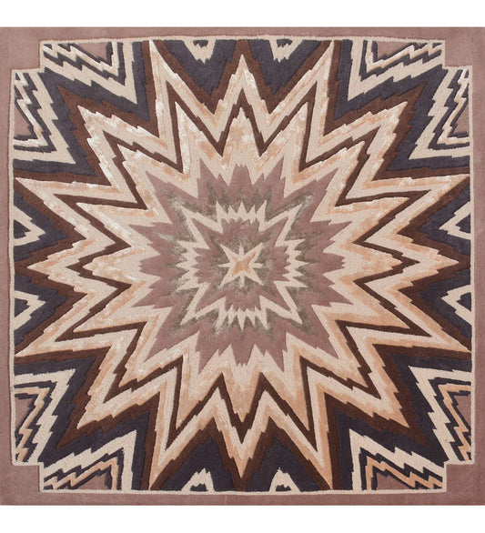 Starburst geometric hand-tufted wool rug in beige, brown, and navy