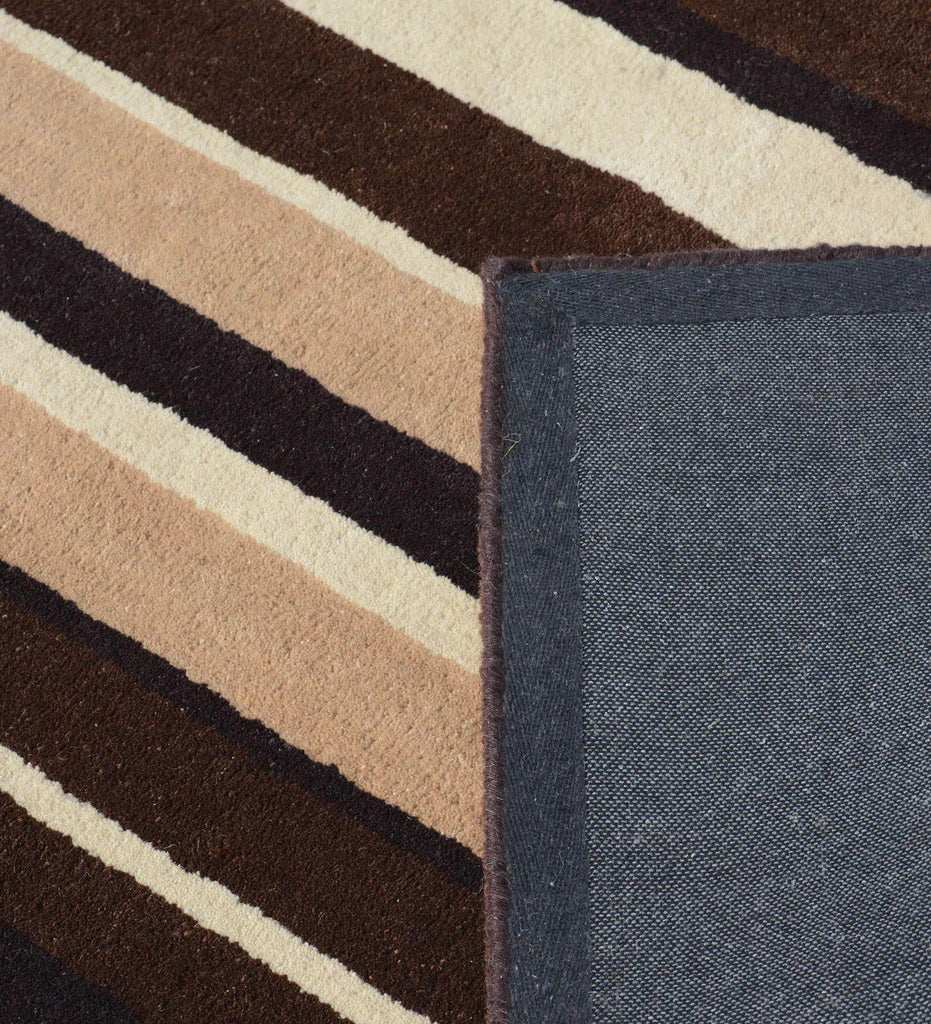 Contemporary striped wool rug handcrafted for luxury interiors.