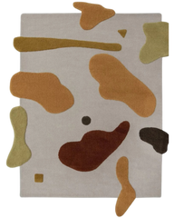 Beige brown mustard hand-tufted wool rug with abstract camo design.