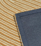 Beige and brown abstract wool rug with flowing curved design