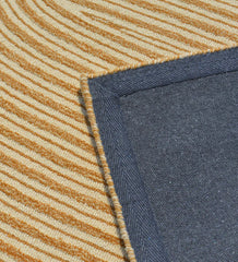 Beige and brown abstract wool rug with flowing curved design