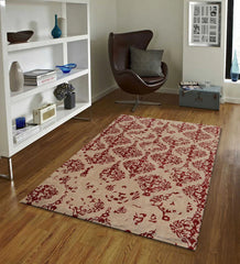 Luxury artisan wool rug with ornate red damask motifs