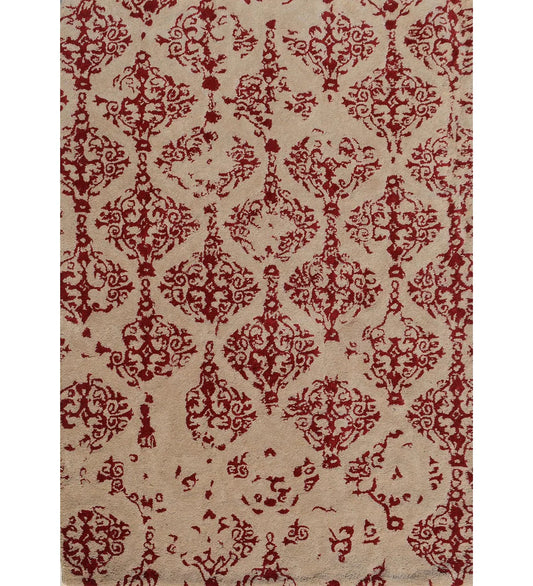 Traditional red damask hand-tufted wool rug on beige base