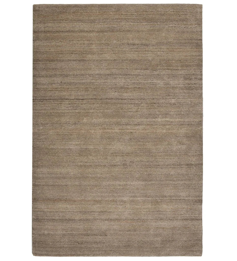 Minimalist beige hand-tufted wool rug with linear texture