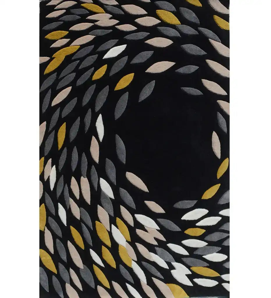 Luxury black wool rug with handwoven abstract leaf pattern in gray, beige, white, and mustard colors