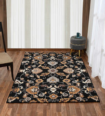 Luxury black wool rug featuring gold and beige floral motifs