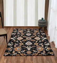 Luxury black wool rug featuring gold and beige floral motifs