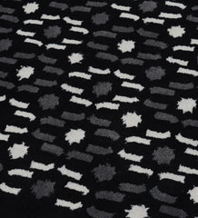 Luxury black rug featuring abstract grey and white details