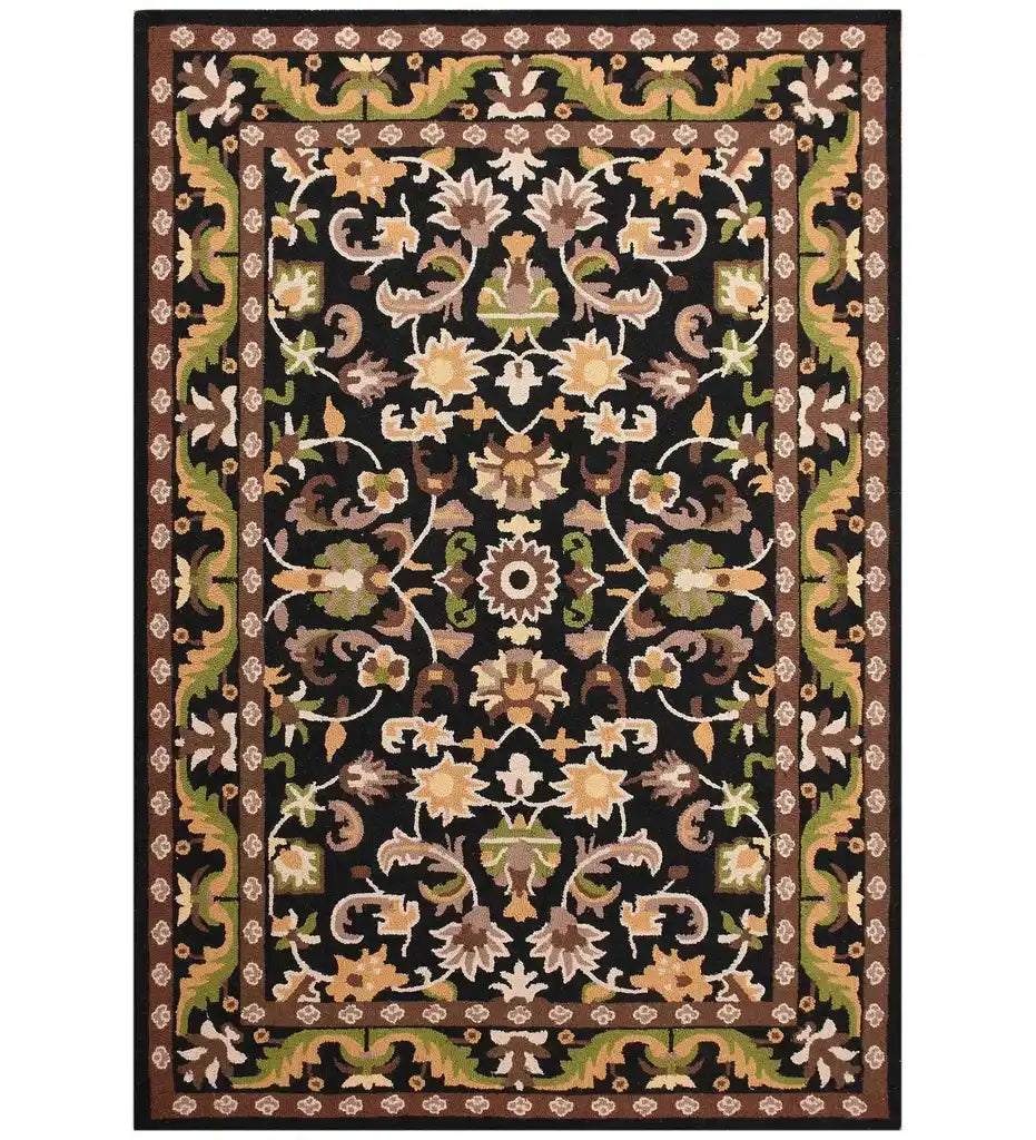 Black traditional hand-tufted wool rug with floral and vine motifs in green, beige, brown colors