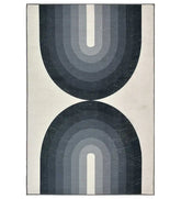Black and gray modern geometric arch rug for contemporary spaces.