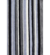 Black, gray, and blue hand-tufted wool rug with vertical striped pattern.