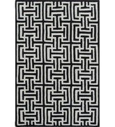 Black and white geometric hand-tufted wool rug with maze pattern