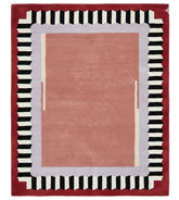 Rug with a striped border on a red background