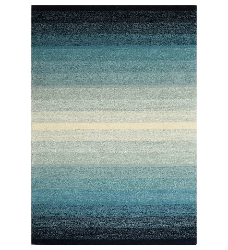 Blue gradient hand-tufted wool rug with ombre striped design