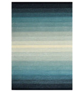 Blue gradient hand-tufted wool rug with ombre striped design