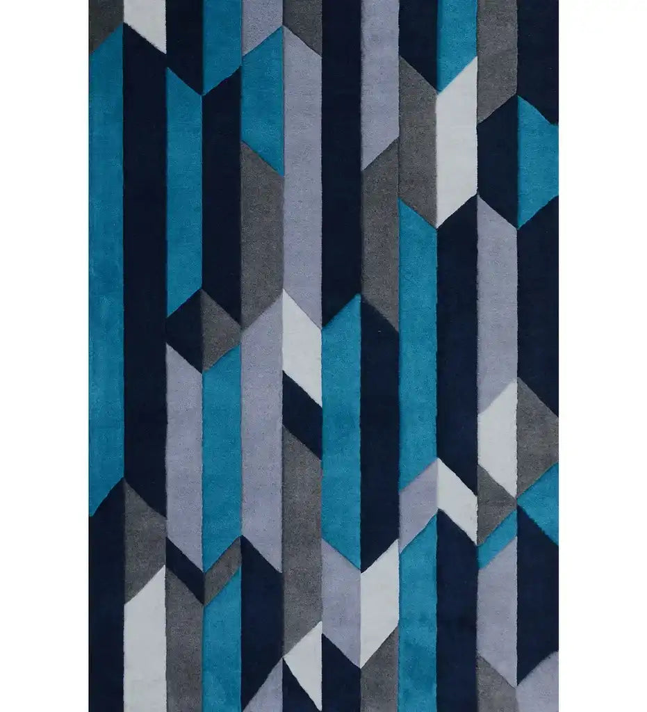 Blue hand-tufted wool rug with geometric pattern in gray, navy, and white