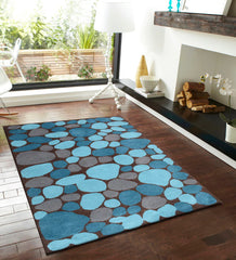 Modern stone-inspired blue wool rug with brown base