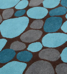 Handmade wool rug with pebble design in blue and grey