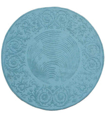 Round blue hand tuftet traditional wool rug with intricate embossed floral and spiral patterns