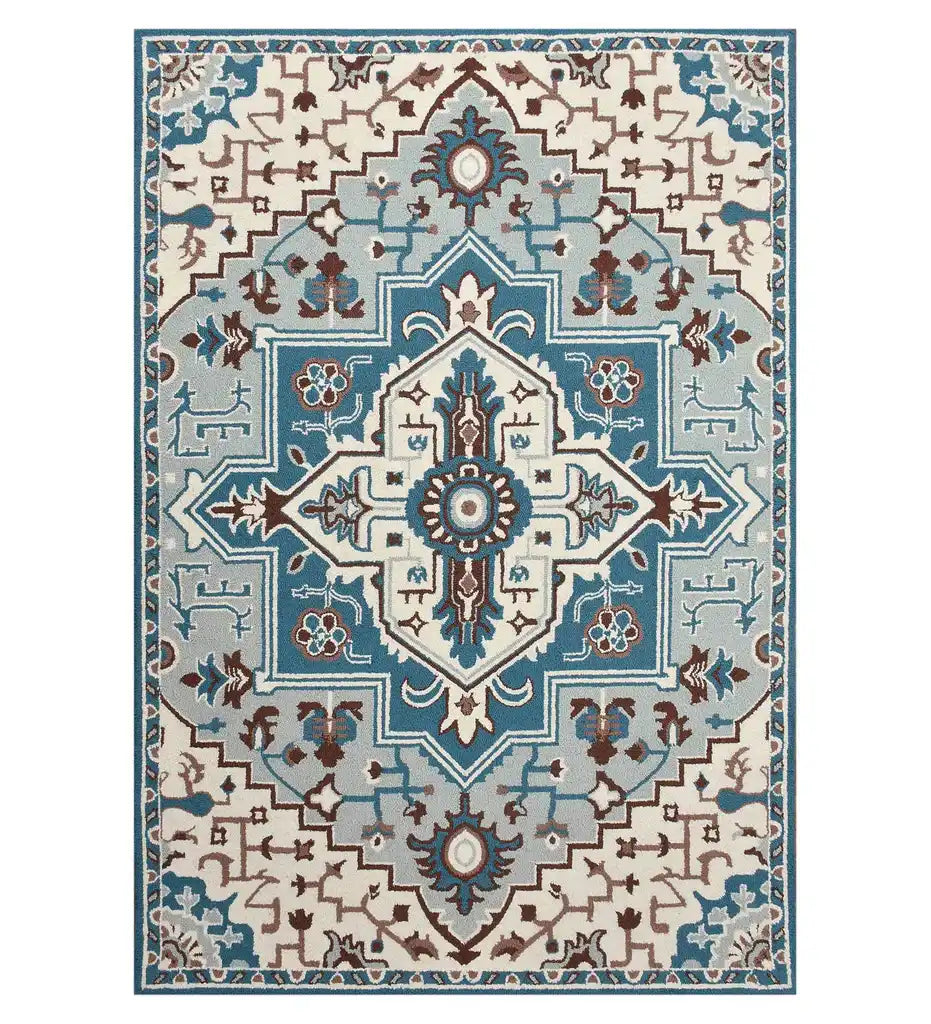 Blue and ivory traditional geometric floral rug with intricate symmetrical patterns