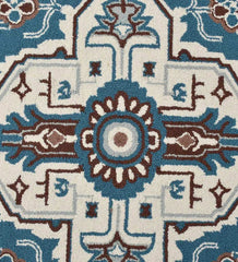 Blue and ivory traditional geometric floral rug with intricate symmetrical design