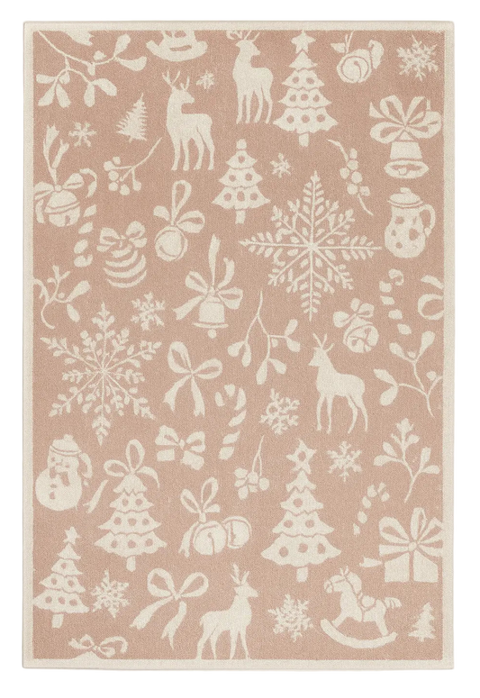 Blush pink Christmas rug with cream reindeer, snowflakes, and festive silhouettes