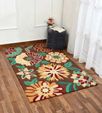 Brown floral hand-tufted wool rug on wooden floor beside gray ottoman with flowers and open book
