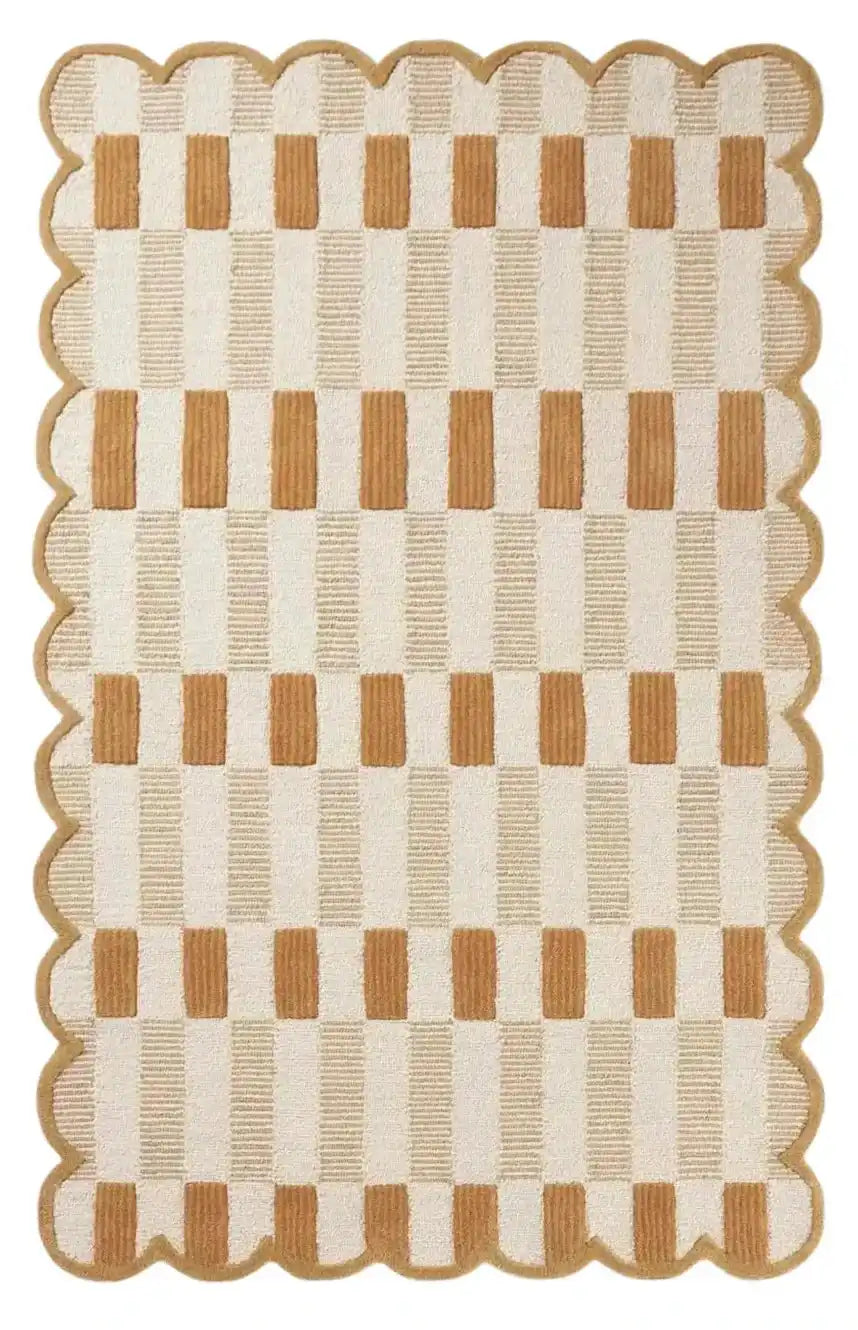 Brown and cream checkered rug with scalloped edges, handwoven texture, modern geometric design
