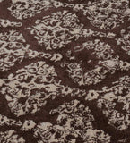 Handmade hand-tufted rug with vintage-inspired damask pattern