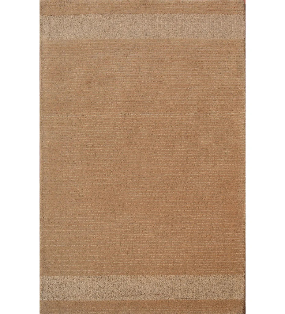 Camel brown solid hand-tufted wool rug with minimalist border accents