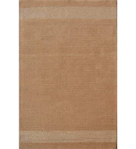 Camel brown solid hand-tufted wool rug with minimalist border accents