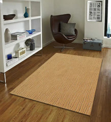 Minimalist modern rug in camel tone with embossed linear design