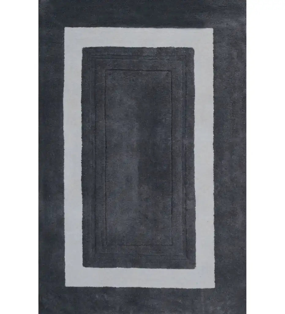 Charcoal grey bordered hand-tufted wool rug with ivory frame