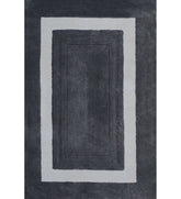 Charcoal grey bordered hand-tufted wool rug with ivory frame