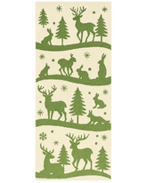 Hand-tufted Christmas rug runner with green reindeer and woodland motifs.
